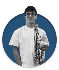 Adi Ben Zeev - playing the saxophone